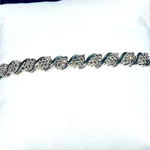 Sterling Silver  7 1/2 “ Diamond encrusted Tennis Braclet
